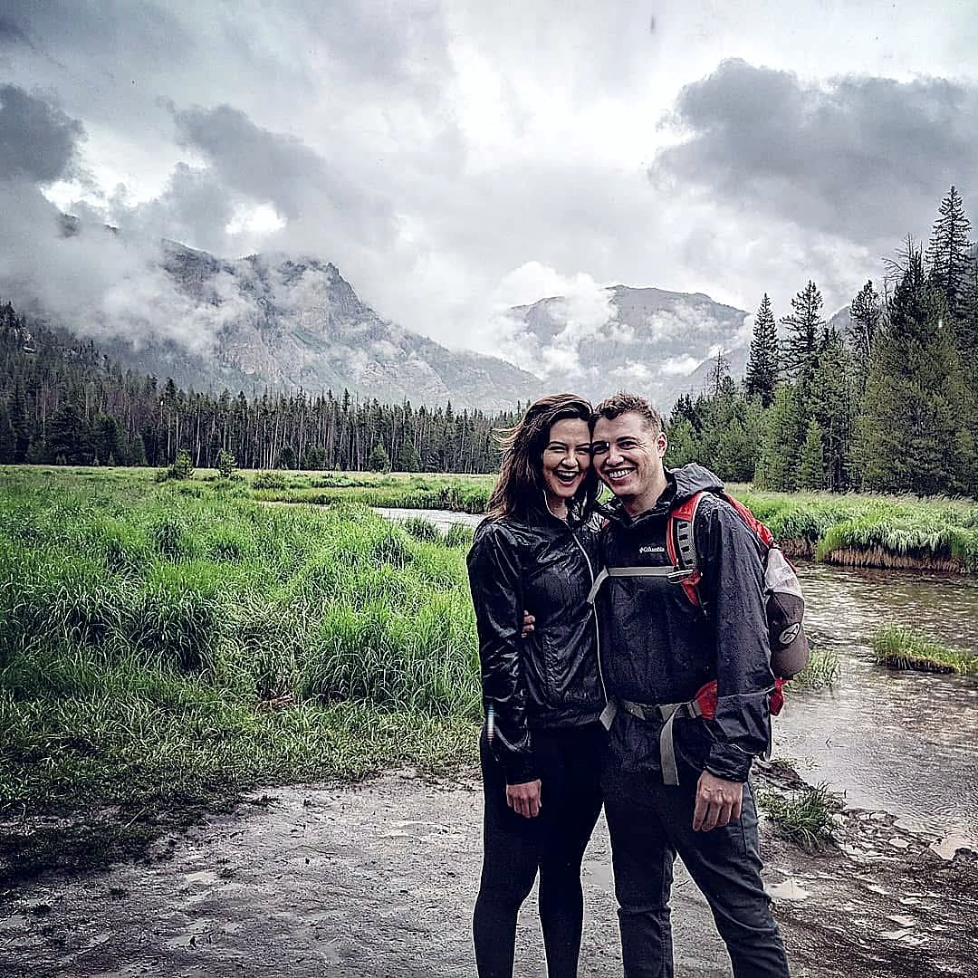 Bryen Alperin and his wife on a rainy trail in Rocky Mountain National Park